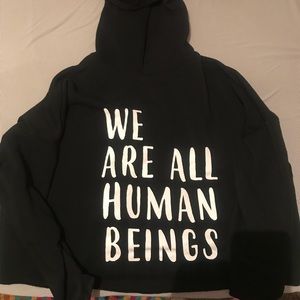 Cropped Black Hoodie “We are all human beings”